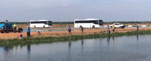 Kids Fishing On Bank