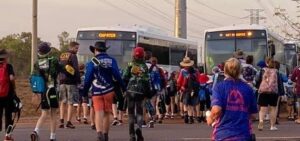 People Walking To The Bus Home
