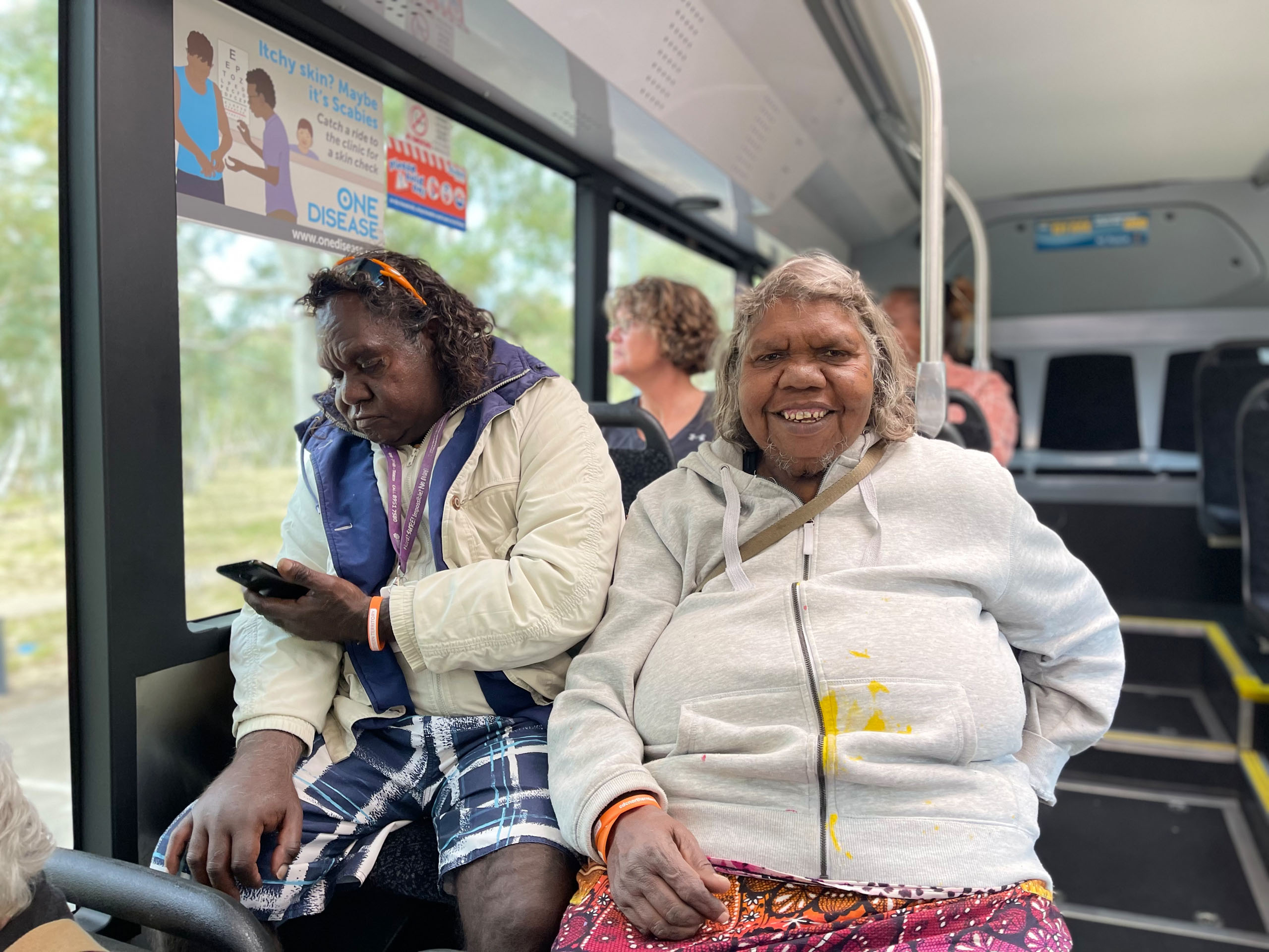 Passengers smiling in the bus